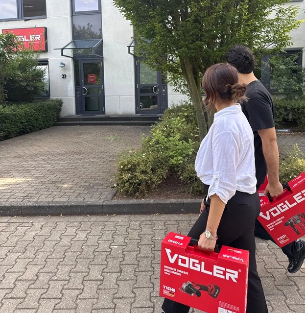 picture of two people holding Vogler tools